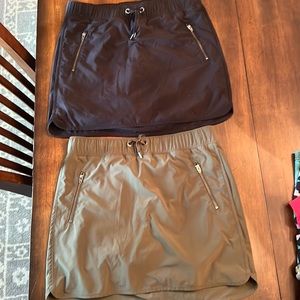 2 Athleta Skorts size small. Black and Olive Green.